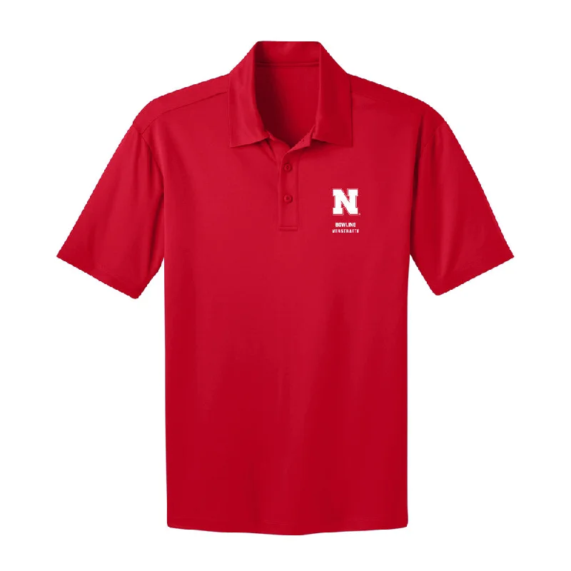 Nebraska - NCAA Women's Bowling : Kayla Verstraete - Activewear Polo Shirt-- Front Pockets Side Pockets Patch Pockets Nebraska - NCAA Women's Bowling : Kayla Verstraete - Activewear Polo Shirt-- Front Pockets Side Pockets Patch Pockets